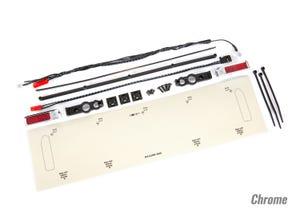 Traxxas LED lights tail lights (red)/ power harness/ tail light housings (left & right)/ tailgate trim (chrome)/ zip ties (3)