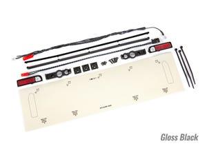 Traxxas LED lights tail lights (red)/ power harness/ tail light housings (left & right)/ tailgate trim (black)/ zip ties (3)