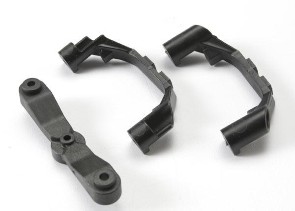 Traxxas Mount, steering arm/ steering stops (2) (lower hinge pin retainer) (includes standard and maximum throw steering stops)