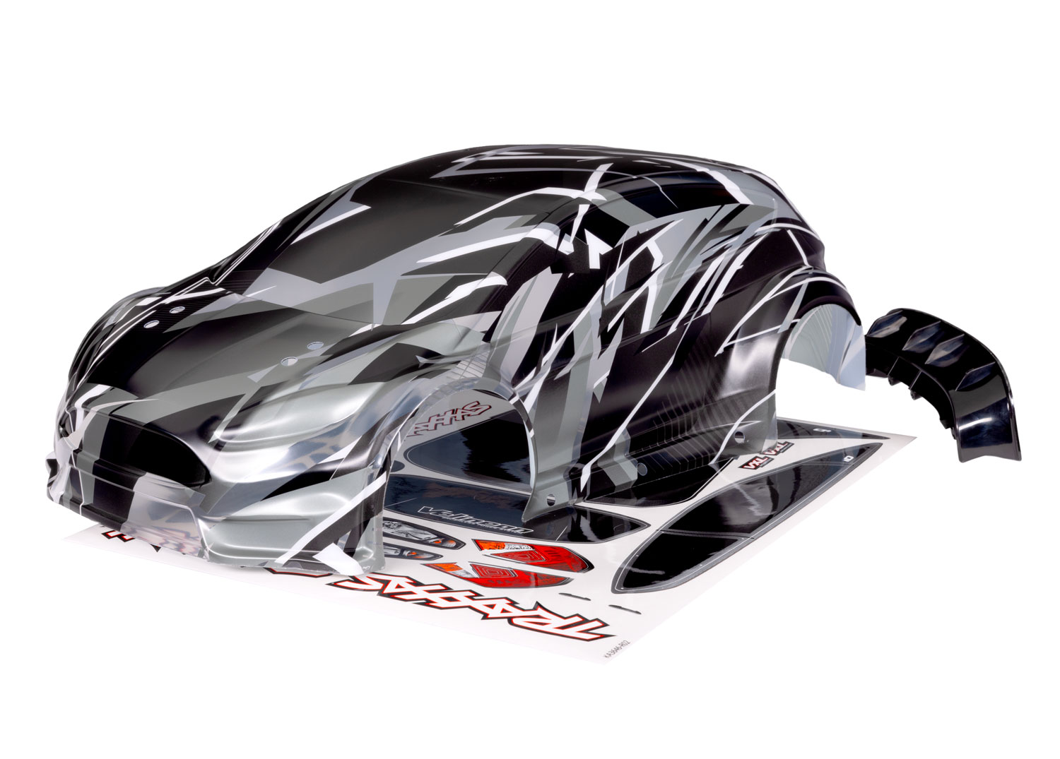 Traxxas Body, Ford Fiesta® ST Rally VXL, ProGraphix® (graphics are printed, requires paint & final color application)/ wing/ 3x8mm FCS (4)/ decal sheet 1/10