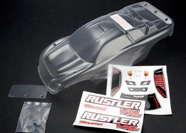 Traxxas Body, Rustler® (clear, requires painting)/window, lights decal sheet/ wing and aluminum hardware